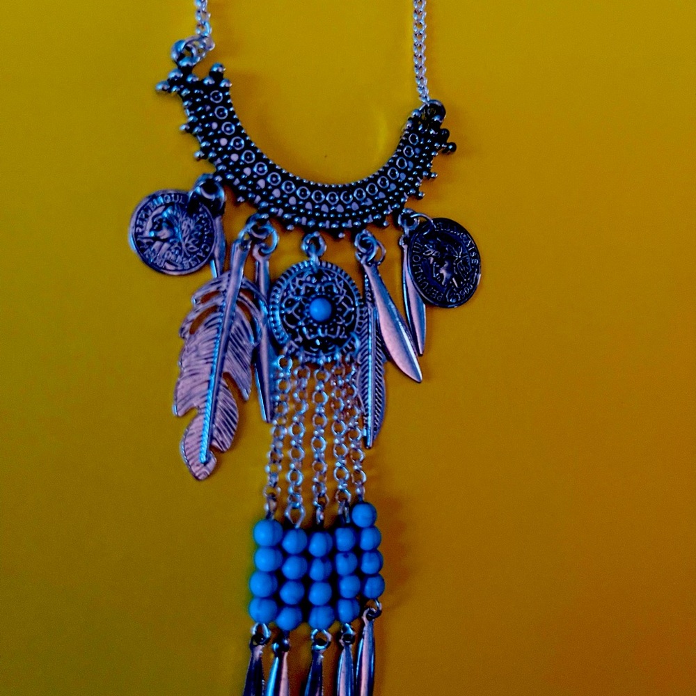 Nadine West long feather statement necklace